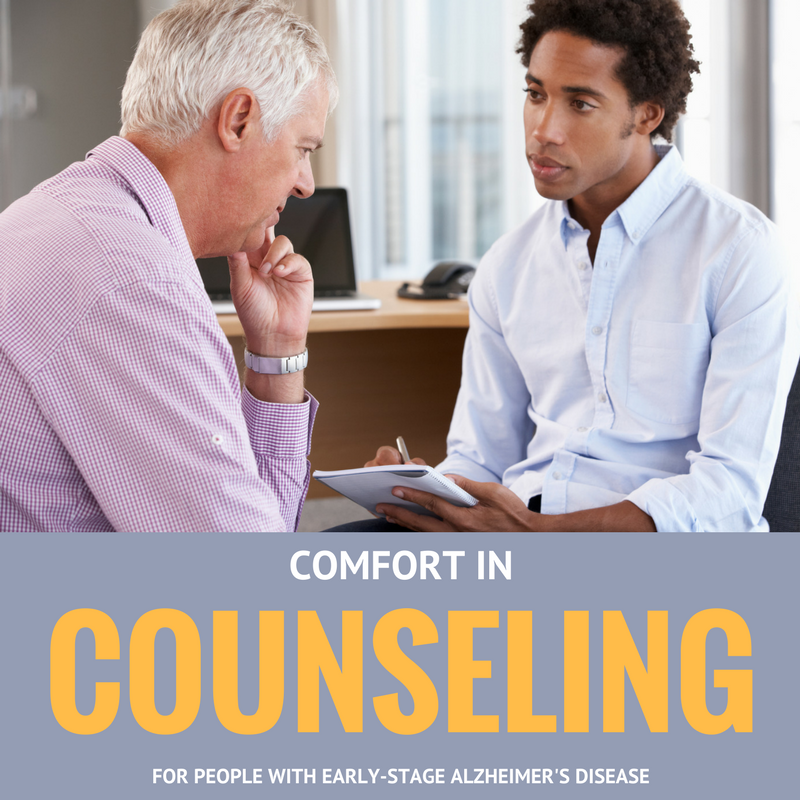 Man with notepad counseling a distressed older man